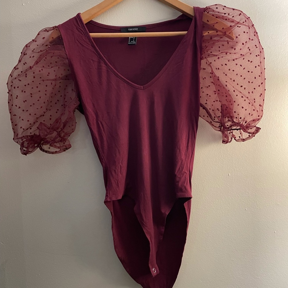 Elegant red blouse, used and in very good condition,